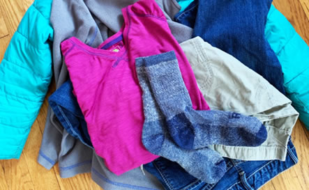 Clothes folded on top of each other.